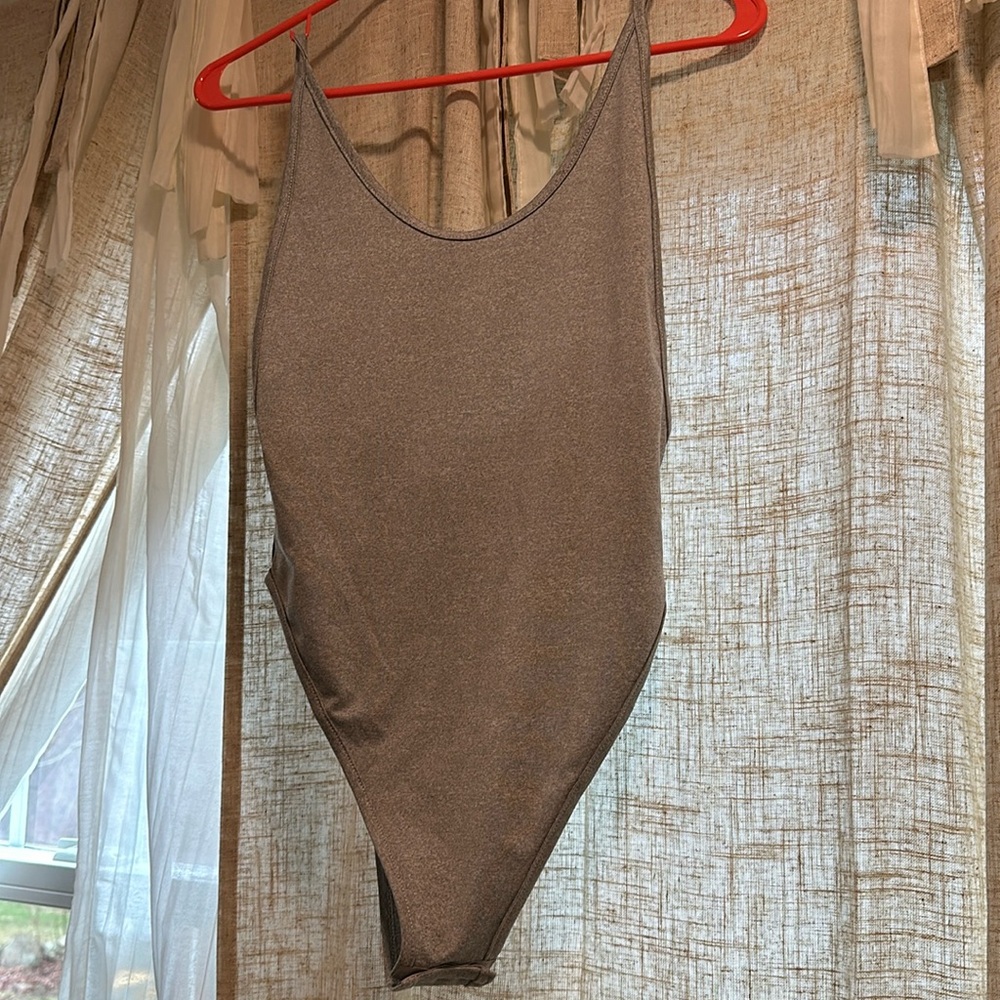 never been worn Grey bodysuit